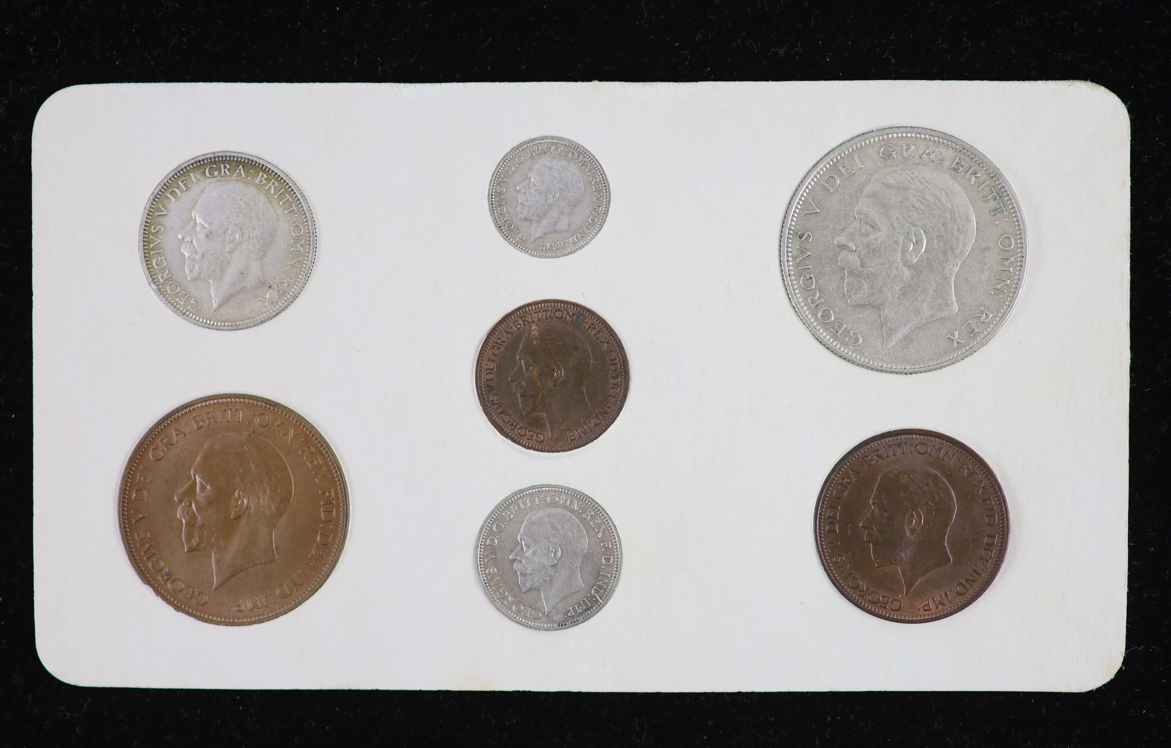 George V specimen set of seven coins, 1934, fourth coinage, comprising halfcrown, shilling, sixpence, threepence, cleaned UNC, penny, halfpenny and farthing, toned UNC